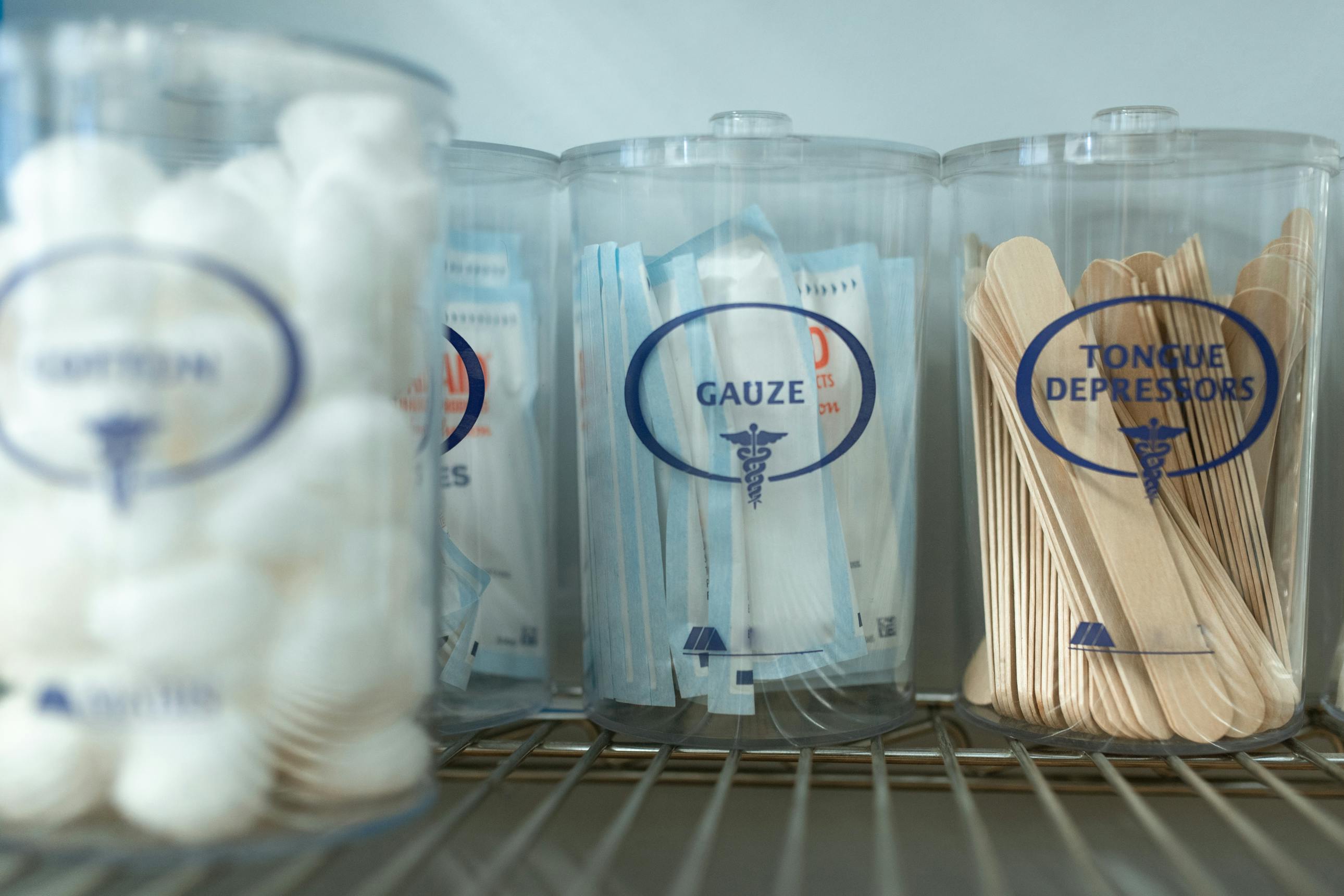 Organized ostomy and home medical supplies on a clean storage shelf