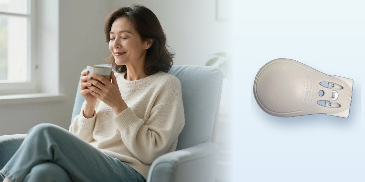 A woman relaxing at home with tea, beside the Stoma Stifler